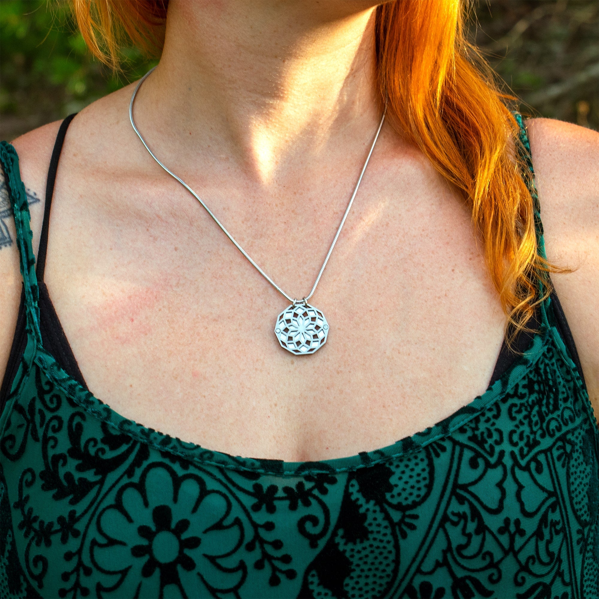 sacred geometry stainless steel bloom pendant